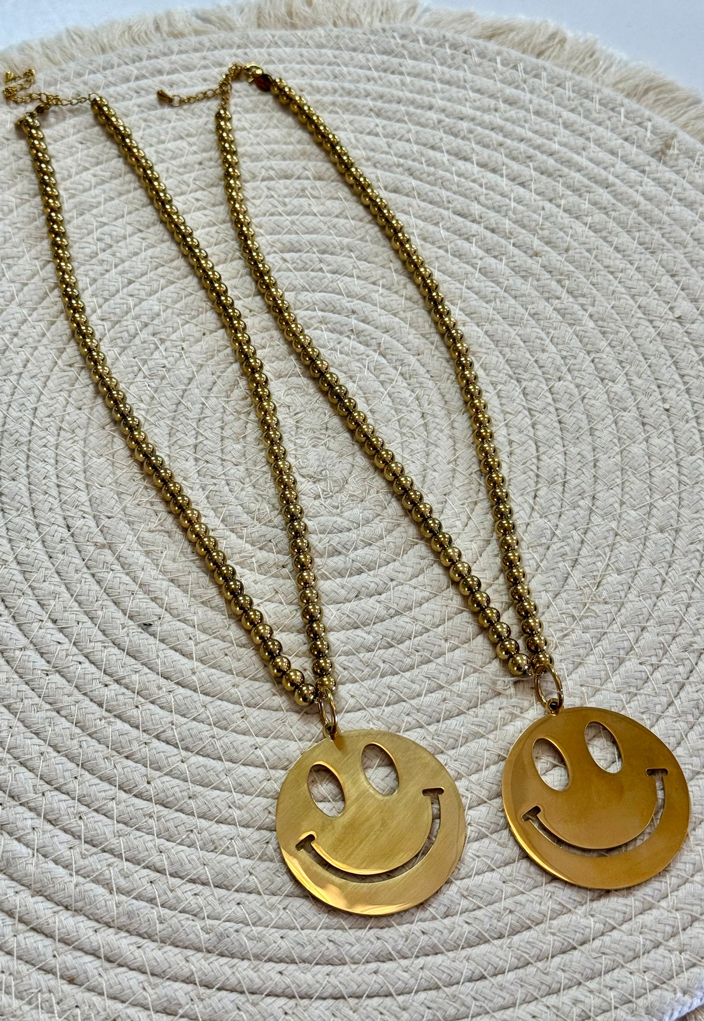 Smiley ketting goud