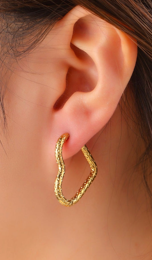 Day en Eve oorbellen open harten