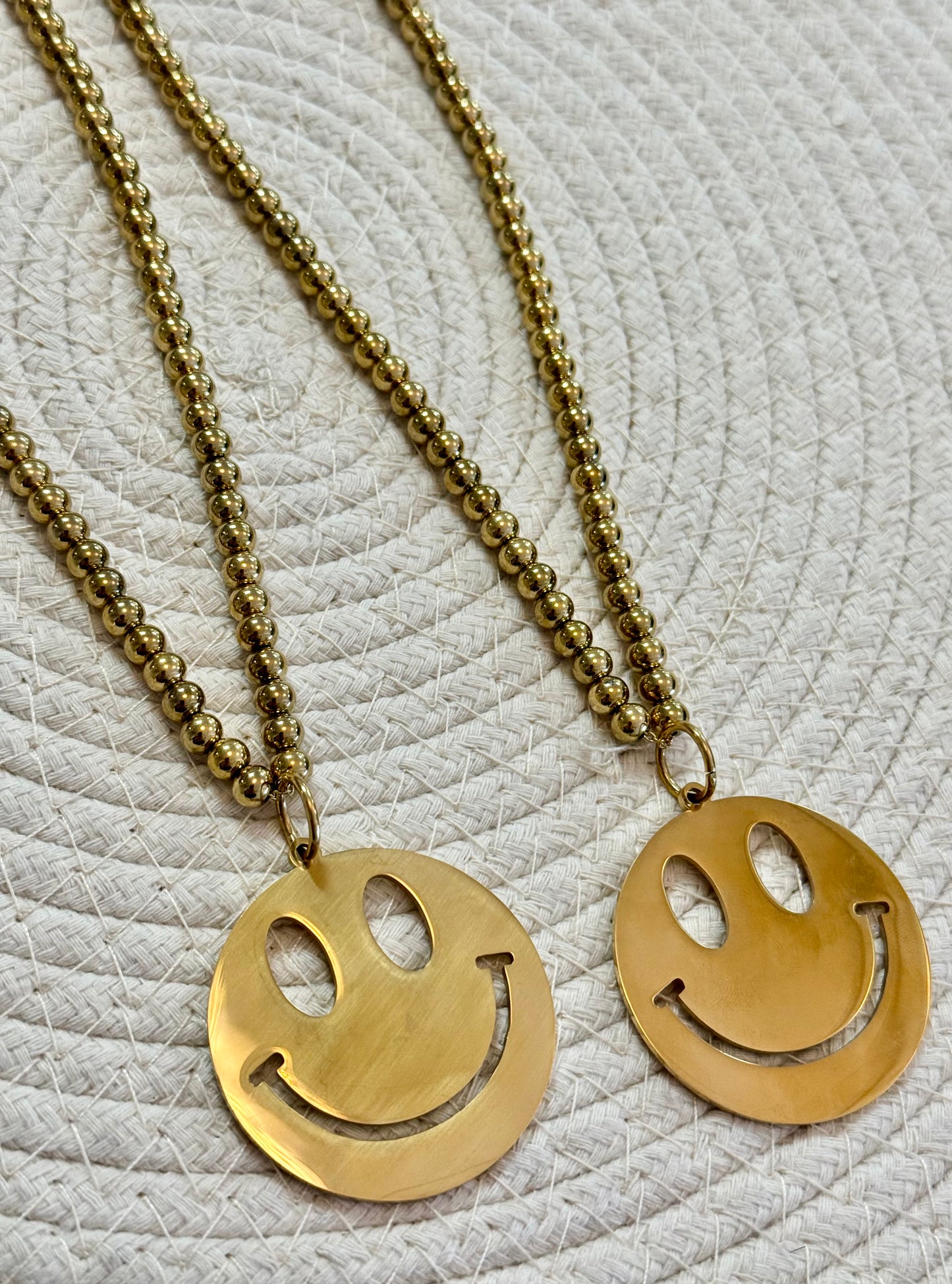 Smiley ketting goud