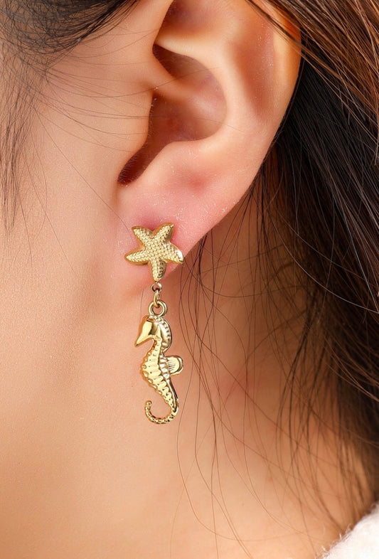 Day en Eve oorbellen zeester met zeepaardje