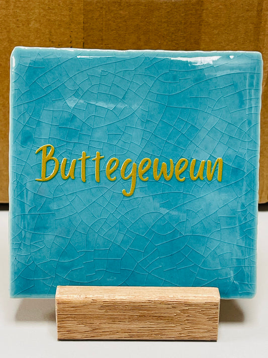 Quote tegel Buttegeweun lichtblauw.