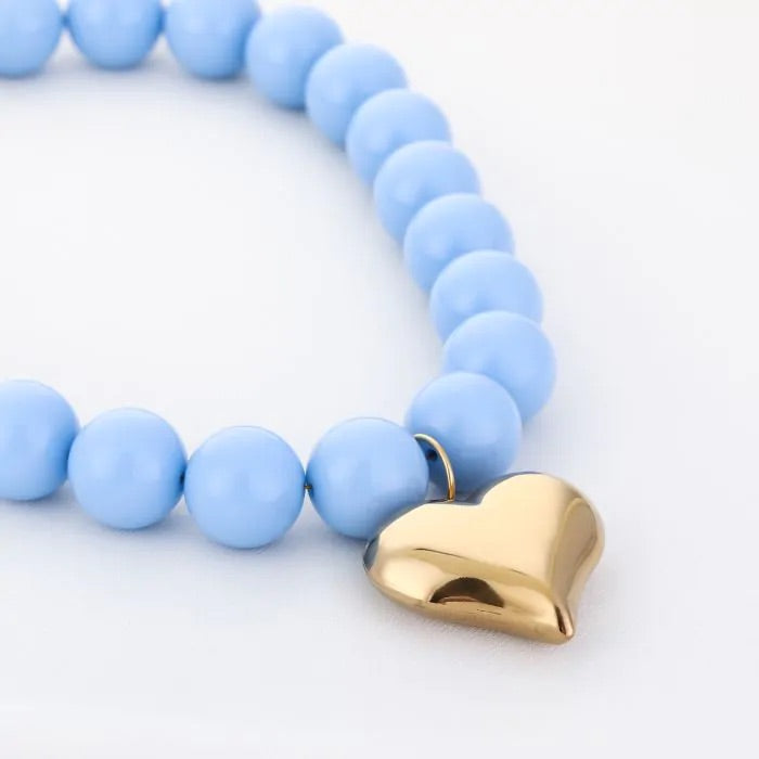 Grote bolletjes ketting blauw met hart goud
