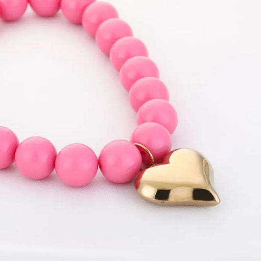 Grote bolletjes ketting roze met hart goud